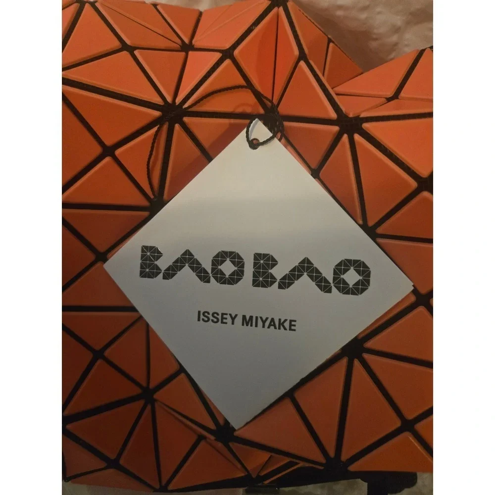 Bao Bao Issey Miyake Wring Matte Orange Bucket Bag, direct from Taipei. Abstract